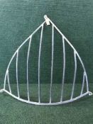 Two metal hay feeders