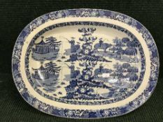 A 19th century Oriental pattern blue and white glazed meat plate