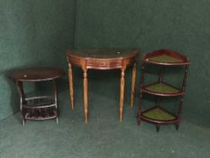 A D-shaped leather topped hall table,