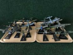Two trays of twenty assorted die-cast and plastic airplanes on stands