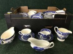 A box and basket of blue and white china