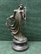 A bronze figure on marble base,