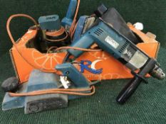 A box of Black and Decker power tools