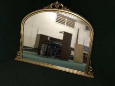 A Victorian style gilt overmantel mirror
