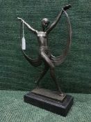 A bronze figure on marble base,