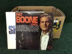 Two boxes of lps, dvds, computer games,