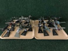 Two trays of twenty assorted die-cast and plastic airplanes on stands