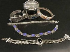 A box of sterling silver jewellery including bangles bracelets