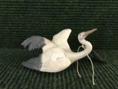 A Lladro figure of a stork,