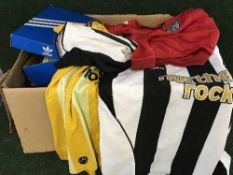 Three boxes of clothing, shoes, Addidas trainers,