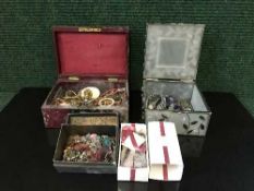 Four small jewellery boxes of costume jewellery