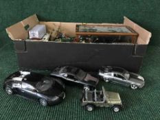 A box of large scale die cast vehicles, modern Dinky vehicles, vintage car in display case etc.