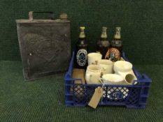 A vintage shell oil can together with a box of commemorative mugs, beakers, moustache cup,