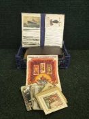 A basket of stamp albums, stamps,