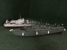 Two plastic remote controlled models - Navy battle cruisers