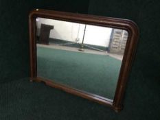 A 19th century mahogany over mantel mirror