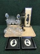 A tray of decanters with stoppers, six champagne flutes,