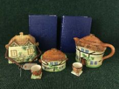 A tray of five pieces of cottage ware and two volumes : The Family Physician