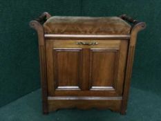 An Edwardian piano stool