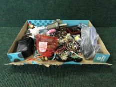 A box of costume jewellery and lighters