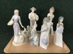 A tray of four Nao figures and three other Spanish figures