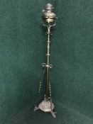 A late nineteenth century telescopic brass oil lamp with chimney and shade