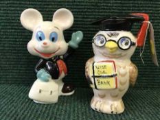 A mid 20th century pottery money box 