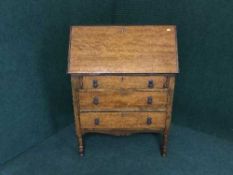 An oak writing bureau