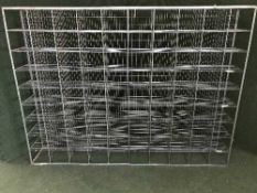 A large set of wire pigeon hole shelves