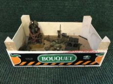 A box of miniature hand built live steam engine parts,