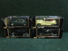 Four boxed Maisto Special Edition large scales die cast vehicles - Jaguar II,