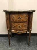 An ormolu inlaid walnut kidney shaped two drawer chest,