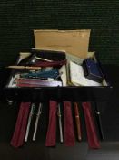 A box of black and white postcards, assorted pens, ration books, Freemasons books,