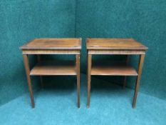 A pair of inlaid mahogany side tables on reeded legs