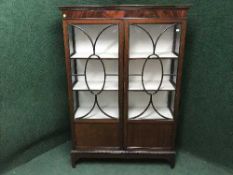 A late Victorian glazed door display cabinet
