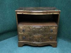 A burr walnut serpentine fronted chest