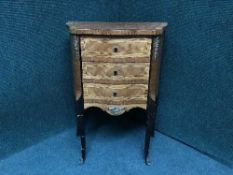 An ormolu mounted inlaid walnut three drawer chest,