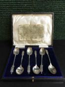 A set of six silver teaspoons, the finials cast as St.