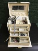 A jewellery box of pendants, earrings,