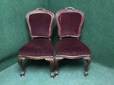 A pair of late Victorian dining chairs