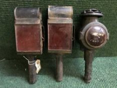Three antique railway lamps