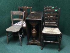 An oak drop leaf table, pair of ladder back chairs,