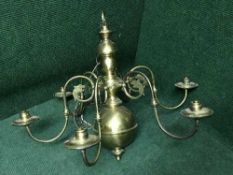 A brass six branch chandelier