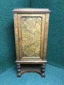 A walnut single door cabinet