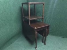 A mahogany drop leaf table and an oak two tier side table