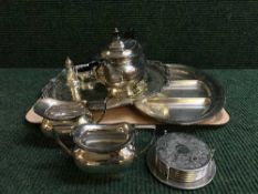 An EPNS scalloped edged tray, three piece Walker & Hall tea service, plated cruet set,