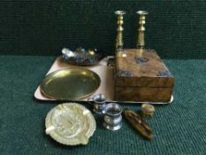 A tray of brass candlesticks, carnival glass bowl, metal ash stand, walnut table box,