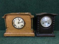 An early twentieth century inlaid oak bracket clock,