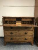 An early 19th century inlaid mahogany secretaire chest