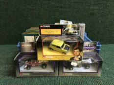 Basket of three boxed Corgi Donnington race cars,
